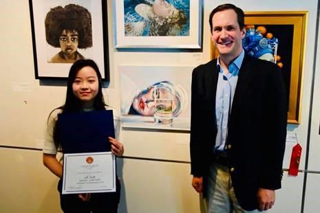 Third place winner Moli Ma with Congressman Himes